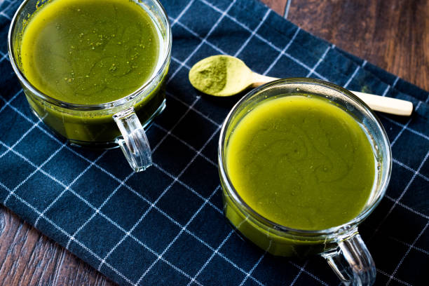 istock Hot Organic Green Matcha Tea in Glass. 954694810