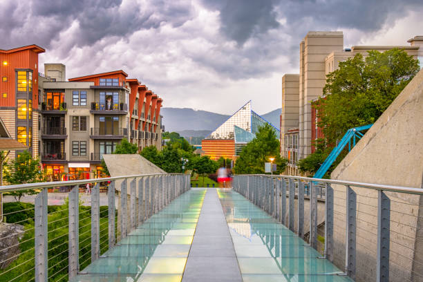 Chattanooga, Tennessee, USA downtown walking path and cityscape at twilight.
