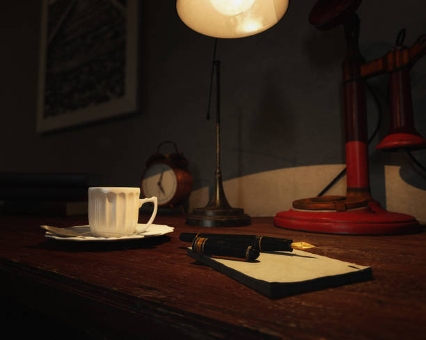 istock old office table with fountain pen, notepad, coffee cup, lamp, clock, red candlestick telephone and books in cinematographic color grading. 3D illustration 954696666