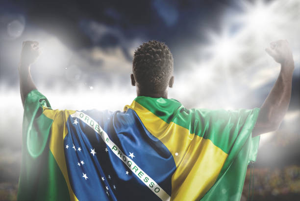 istock Brazilian fan celebrating in the stadium 954701968