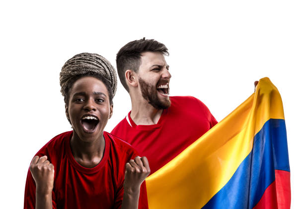 istock Colombian couple fan celebrating on white background 954702232