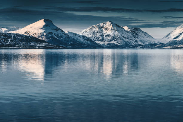 istock lofoten skyline with snowcapped peaks 954702360