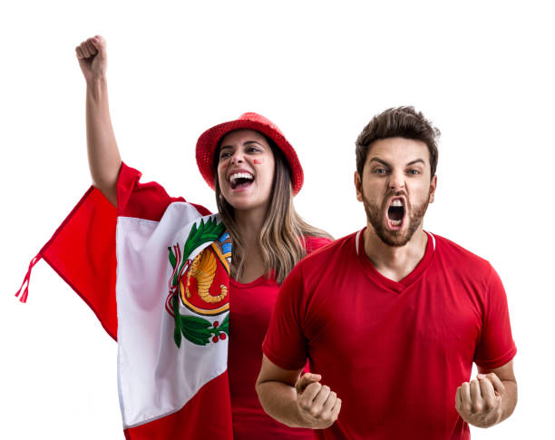 istock Peruvian couple fan celebrating on white background 954702598