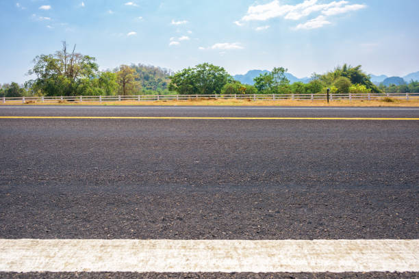 istock Asphalt road and countryside views 954702804