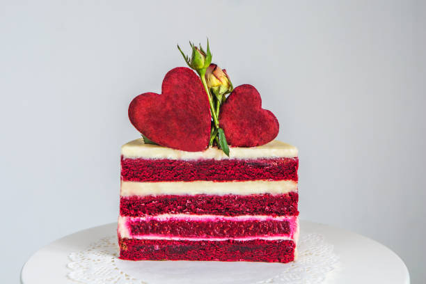 istock Cut a small red-and-white cake for Valentine's Day 954707766