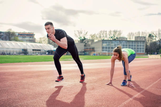 istock Friends jogging on the track 954716464