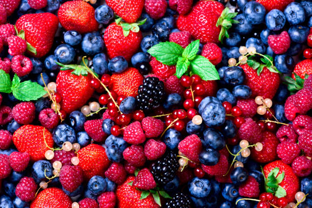 istock strawberries, blueberries, raspberries and black berries. fresh berries on white background 954718166