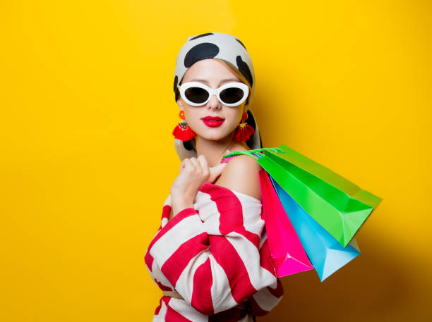 istock Style woman with shopping bags 954722964
