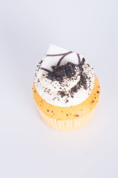 istock cupcake. chocolate cupcakes on the background. 954726950