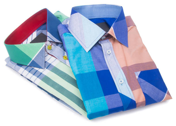 istock shirt. mens shirt folded on background 954728174