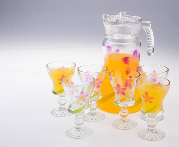 istock orange juice on the background 954741024