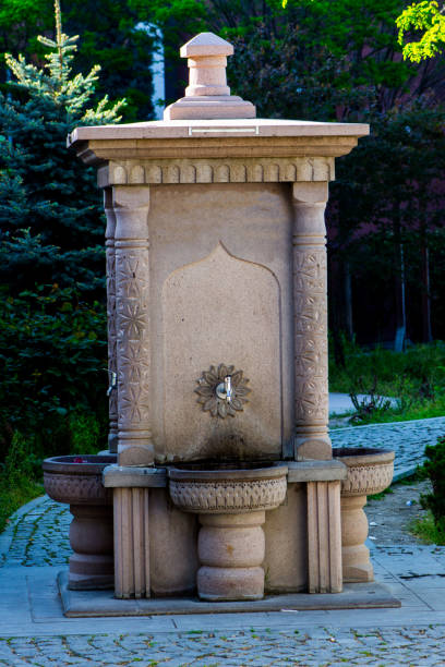 istock Beautiful stone fountain 954746040