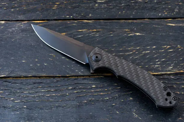 Photo of Elegant handsome knife in black.