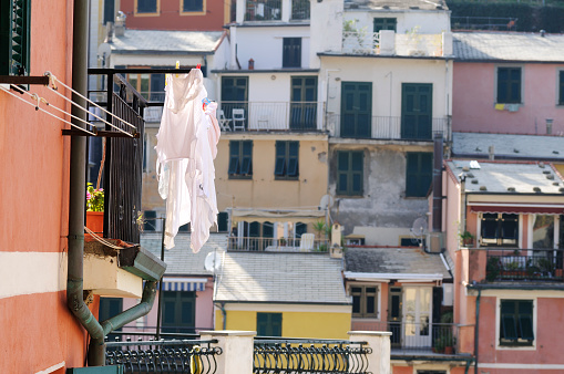 Laundry hangs out to dry in the afternoon sun of Vernazza, one of five fishing villages in Cinque Terre, Italy.