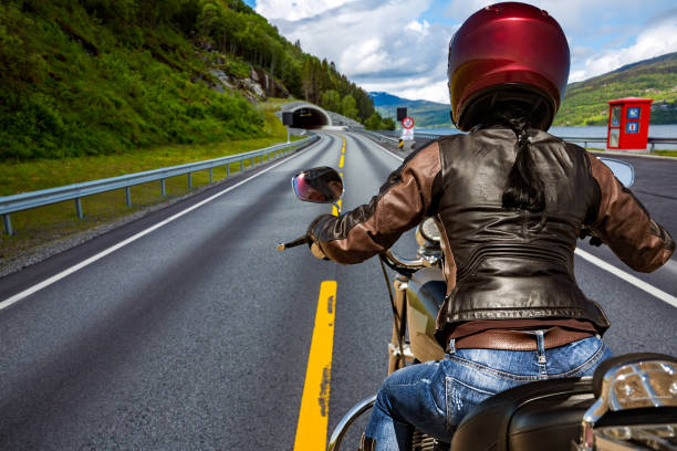 istock Biker girl First-person view, mountain serpentine. 954769736