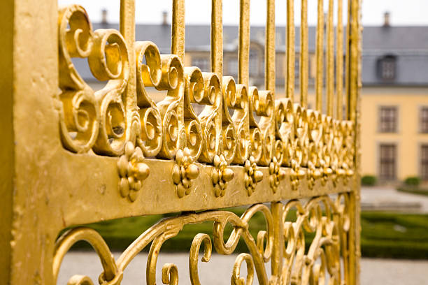Close-up of traditional painted iron railing decorations on the street in central Dublin, Ireland.