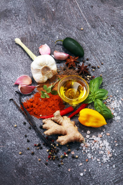 istock Spices and herbs on table. Food and cuisine ingredients. 954770710