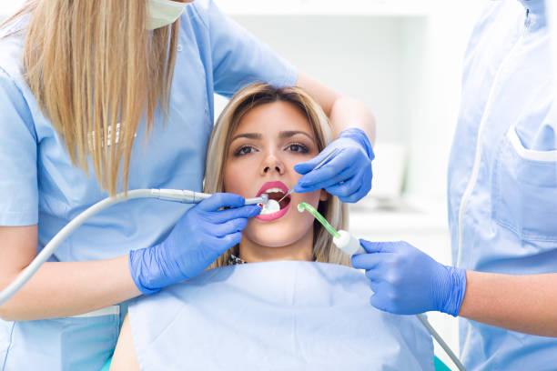 istock young woman having dental exam 954779972
