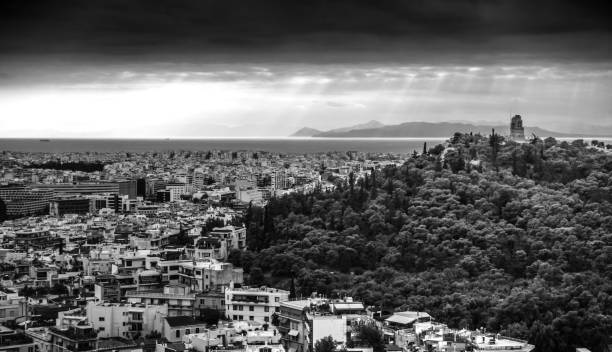 Scenic view of town with sea and mountain, Athens, Greece