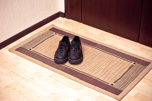 istock Boots on the door-mat 95478424
