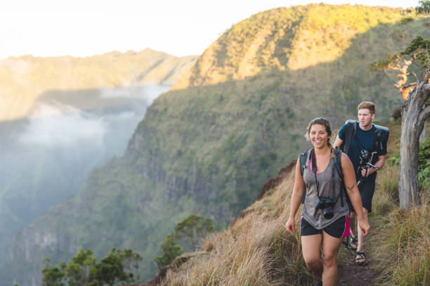 istock Photographers hiking up Hawaii mountain 954787370