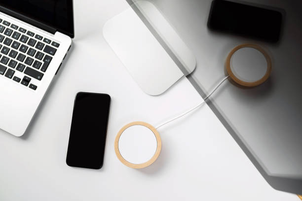 istock Mobile phone and wireless charger 954793826