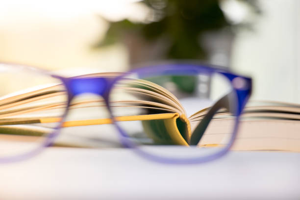 istock Soft focus glasses,blur books, book blur. 954796410