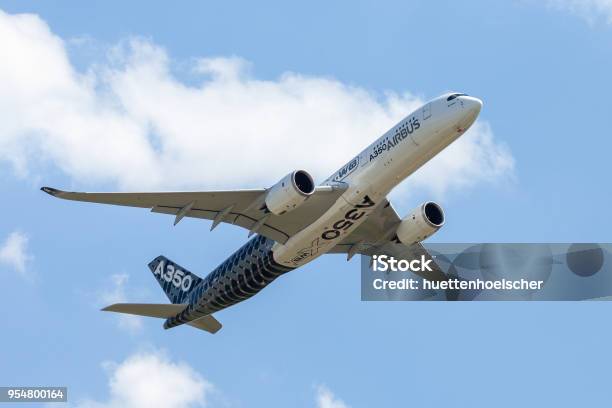 Airbus A350 Xwb Plane Flies At Airport Berlin Schoenefeld Stock Photo - Download Image Now