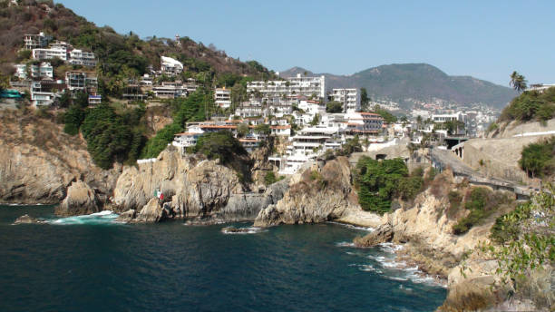 istock Houses On Cliff At Acapulco Guerrero. Mexico 954802100