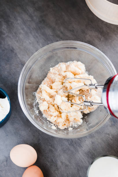 istock MIxing baking ingredients in a bowl on dark 954809796