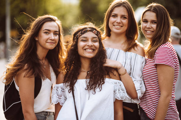 istock teens friends walking in the city 954839464