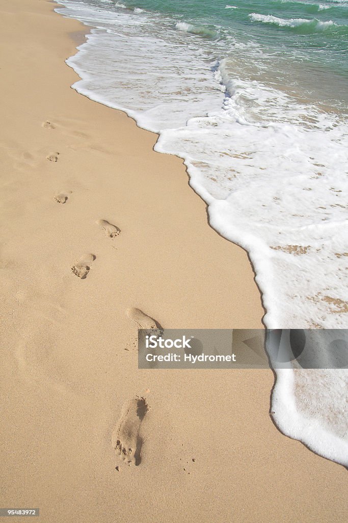 beach, wave and footsteps Beach Stock Photo