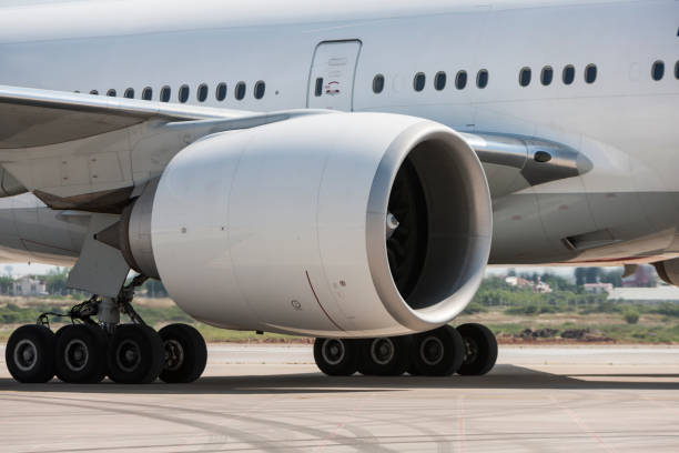 istock Boeing 777 Passenger Airplane Jet Engine and Landing Gear 954842086