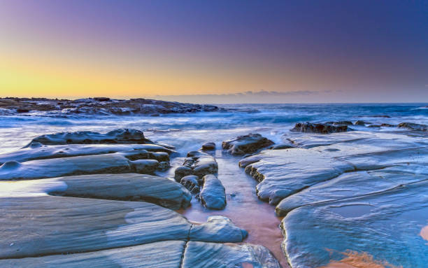istock Sunrise Seascape and Rock Platform 954842218