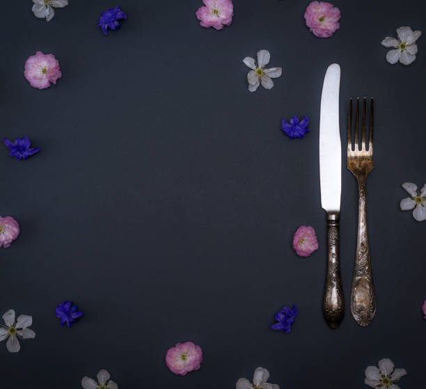 istock iron vintage cutlery fork and knife on black background 954843456