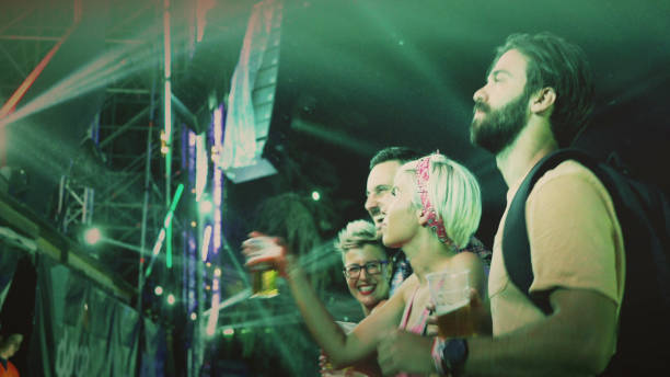 istock People at the first row at concert 954848326