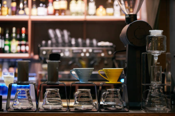 istock Coffee machine and glassware in coffee shop 954848356