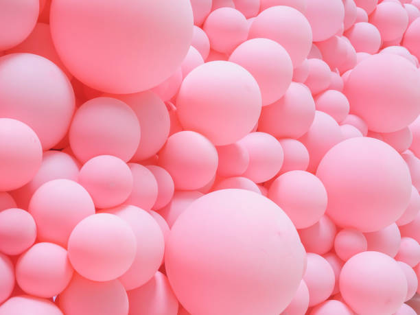 Texture of pink balloons as wall background. stock photo