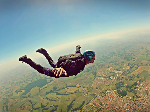 istock Skydiver freedom concept vintage color 954858822