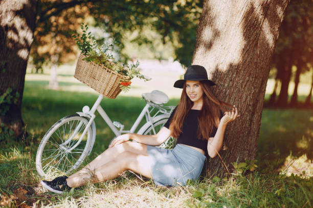 istock Girl with a bike 954859590