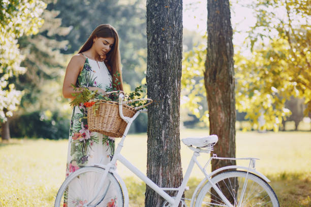 istock Girl with a bike 954859694