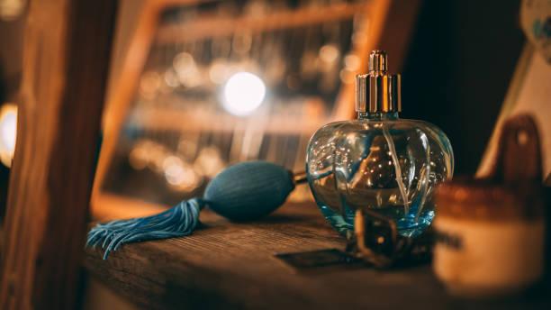 istock Blue old fashion glass perfume container 954860190