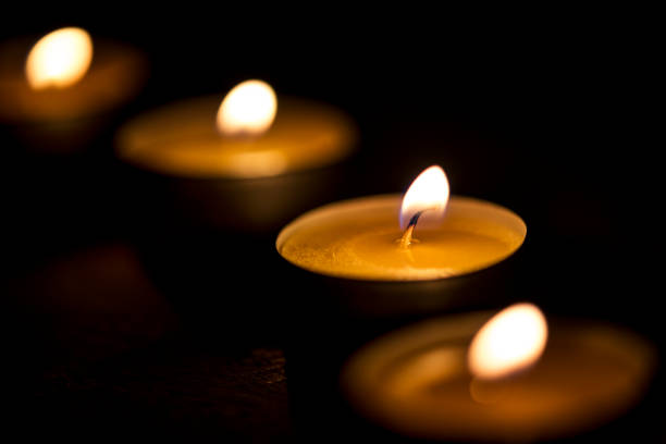 istock Candles glowing in the dark 954863114