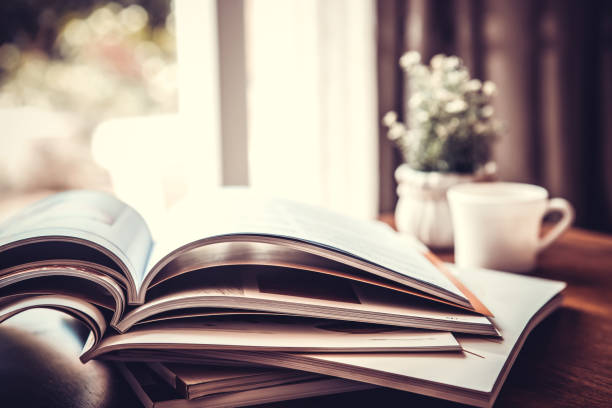 selective focus of  stacking magazine place on table in living room