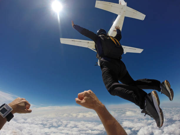 istock Skydiver jump out of plane 954868258