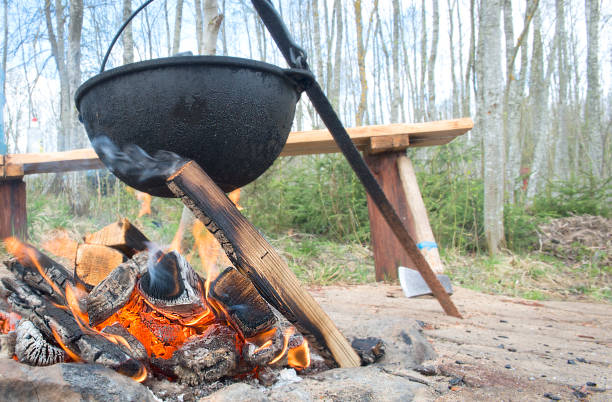 istock Cooking on the fire in the pot. 954880974