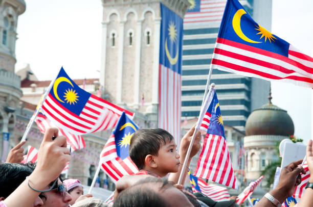 comemorações do dia de malaysia - parade flag child patriotism - fotografias e filmes do acervo