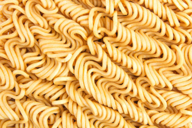 istock Instant noodles background, raw food 954892576