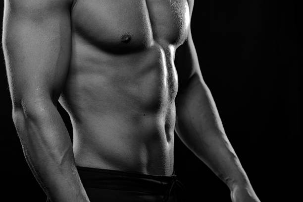 istock Muscular fitness model posing shirtless 954896212
