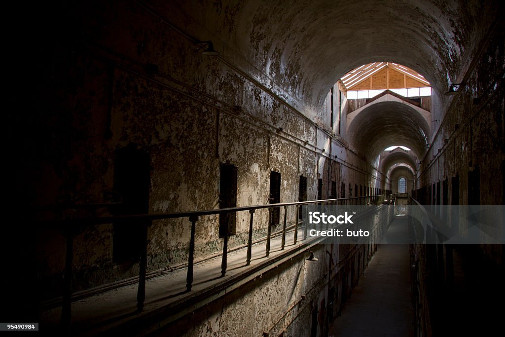 Long, Dark Hallway of Abandoned Prison, Eastern State Penitentiary  East Stock Photo